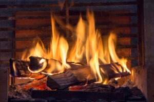Fireplace using top-down method to improve chimney performance
